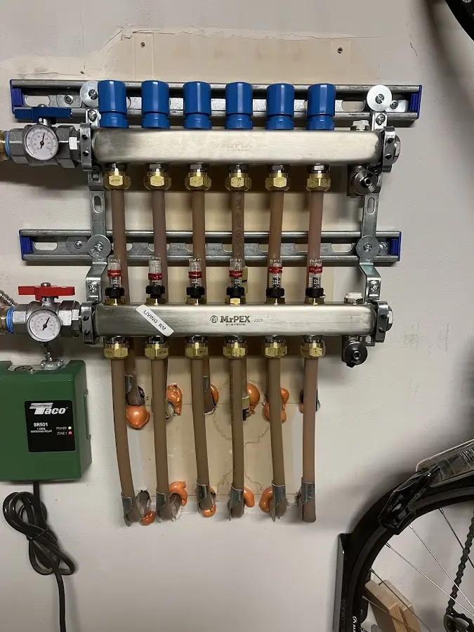 Plumber performing Water Heater Repair at a residential property in Wimauma